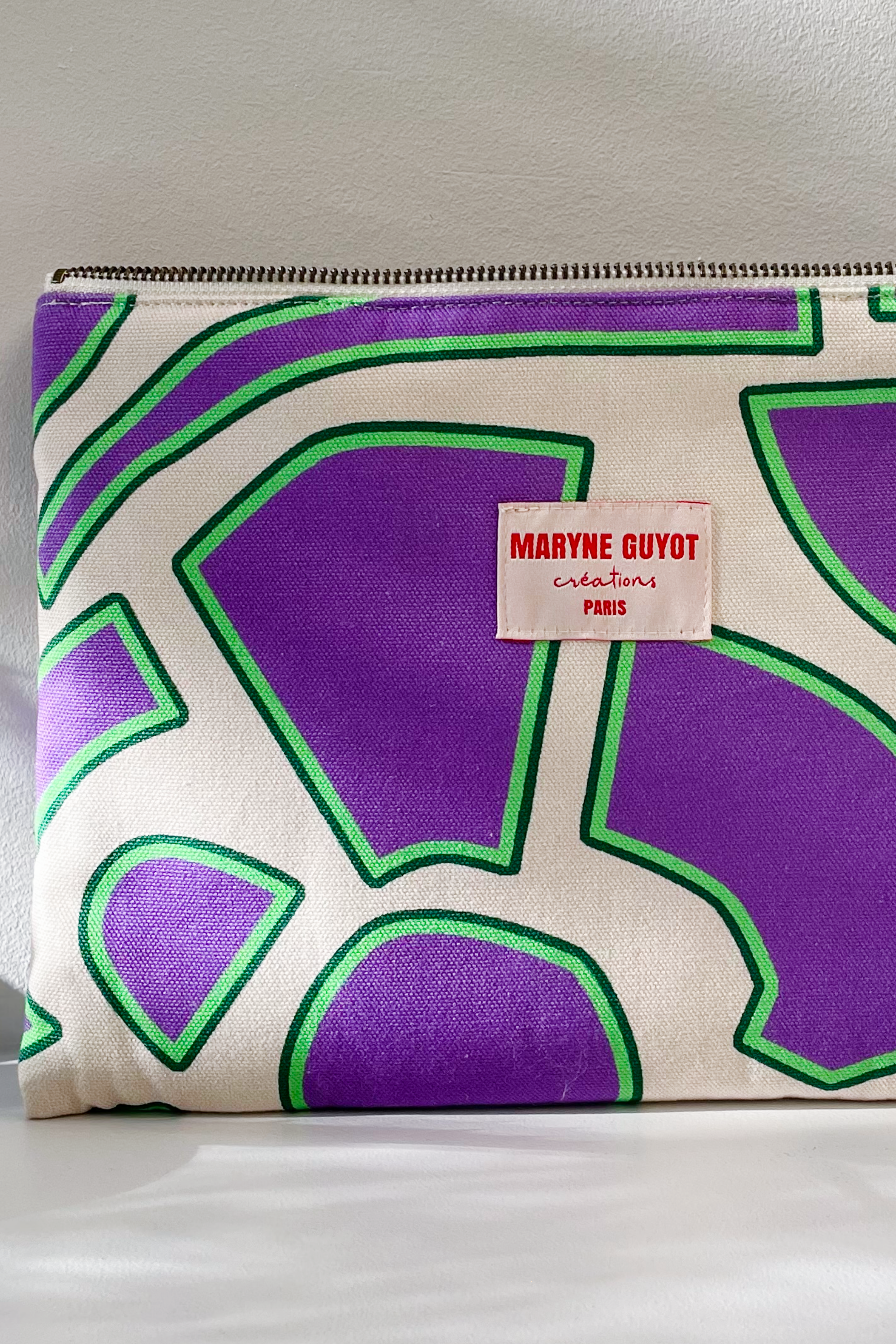 Trousse plate motif spiral violet et green