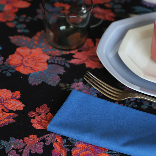 La serviette de table coton et lin fleurs de Noël