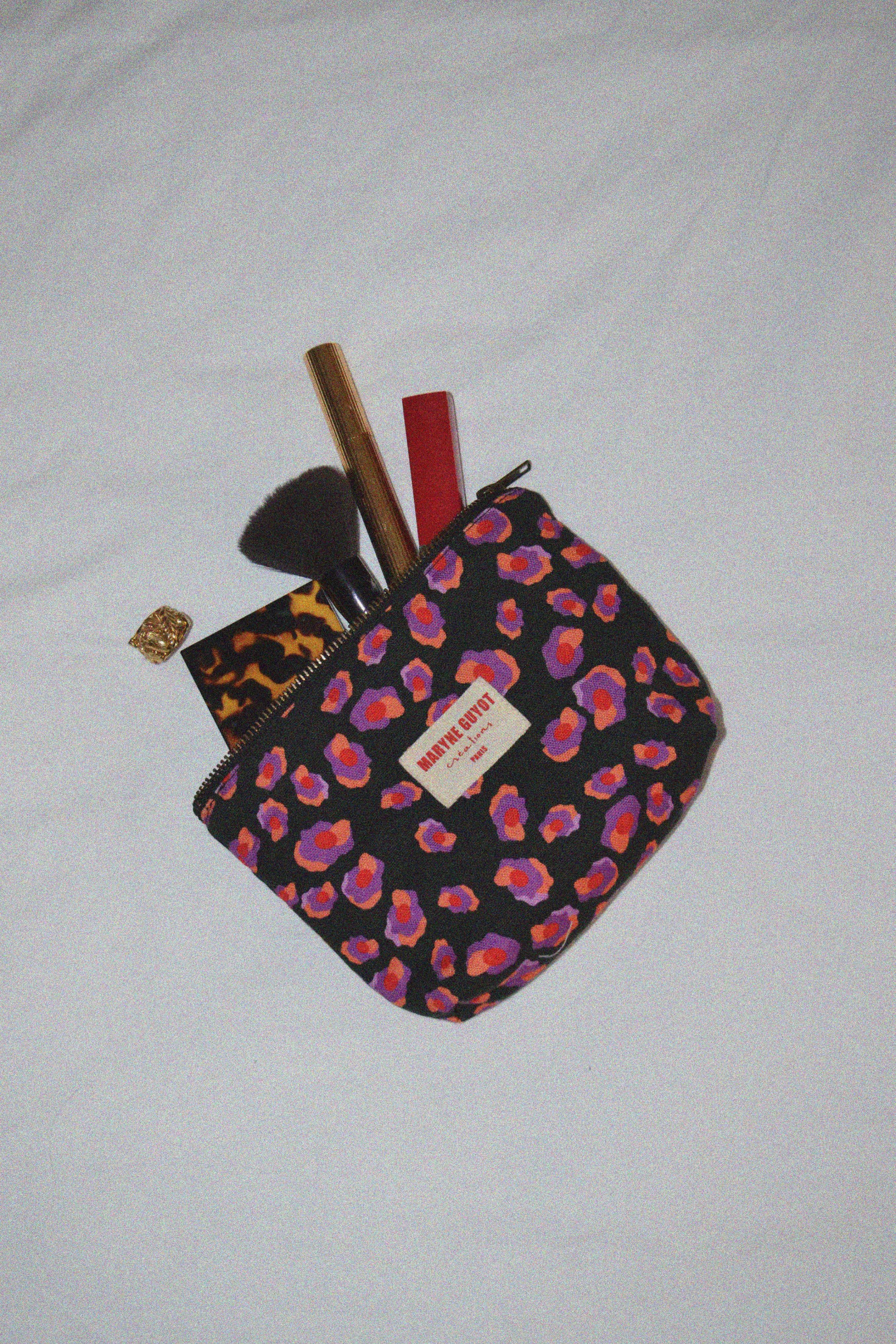 Pochette beauté motif léopard noir