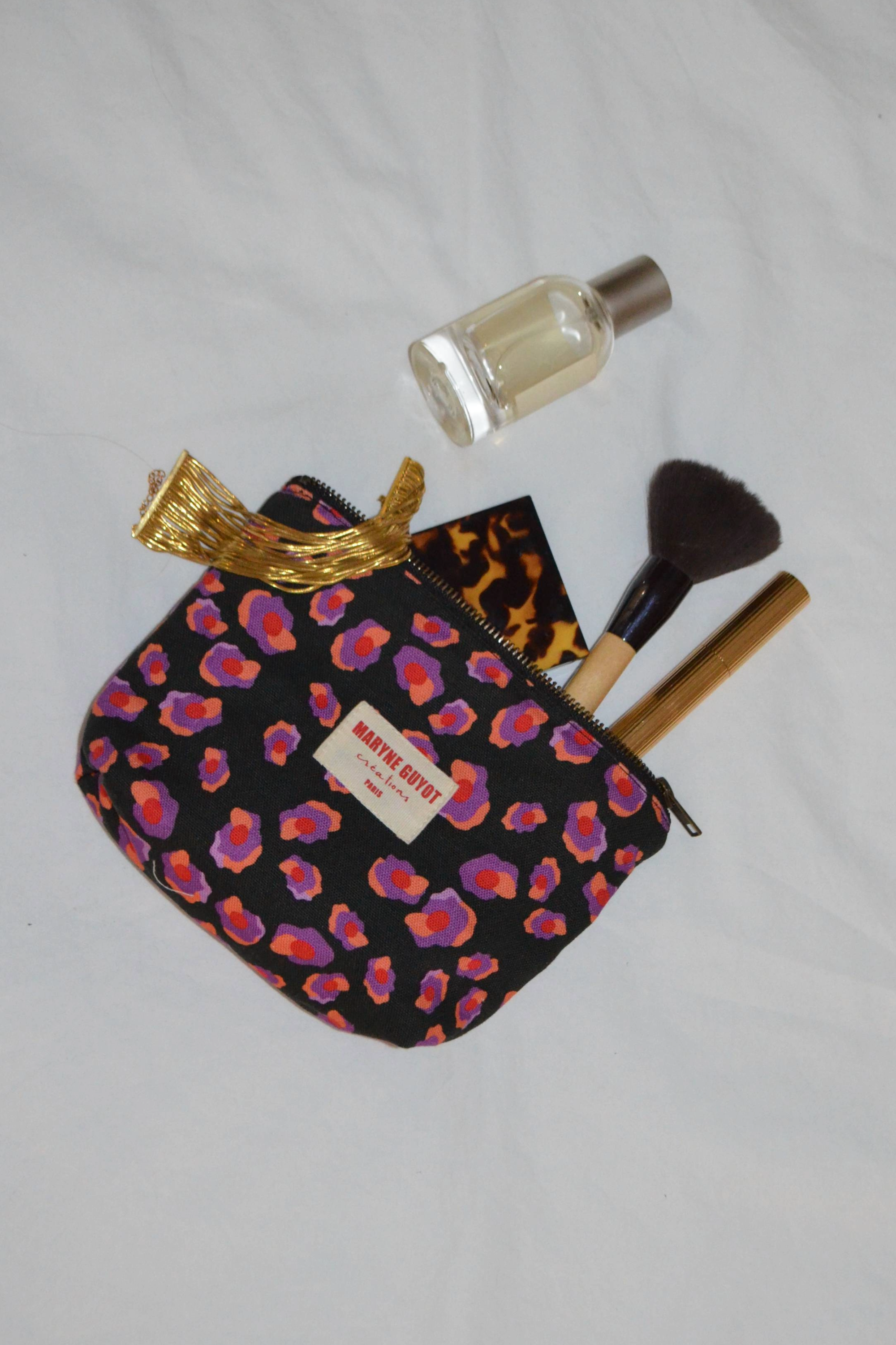 Pochette beauté motif léopard noir