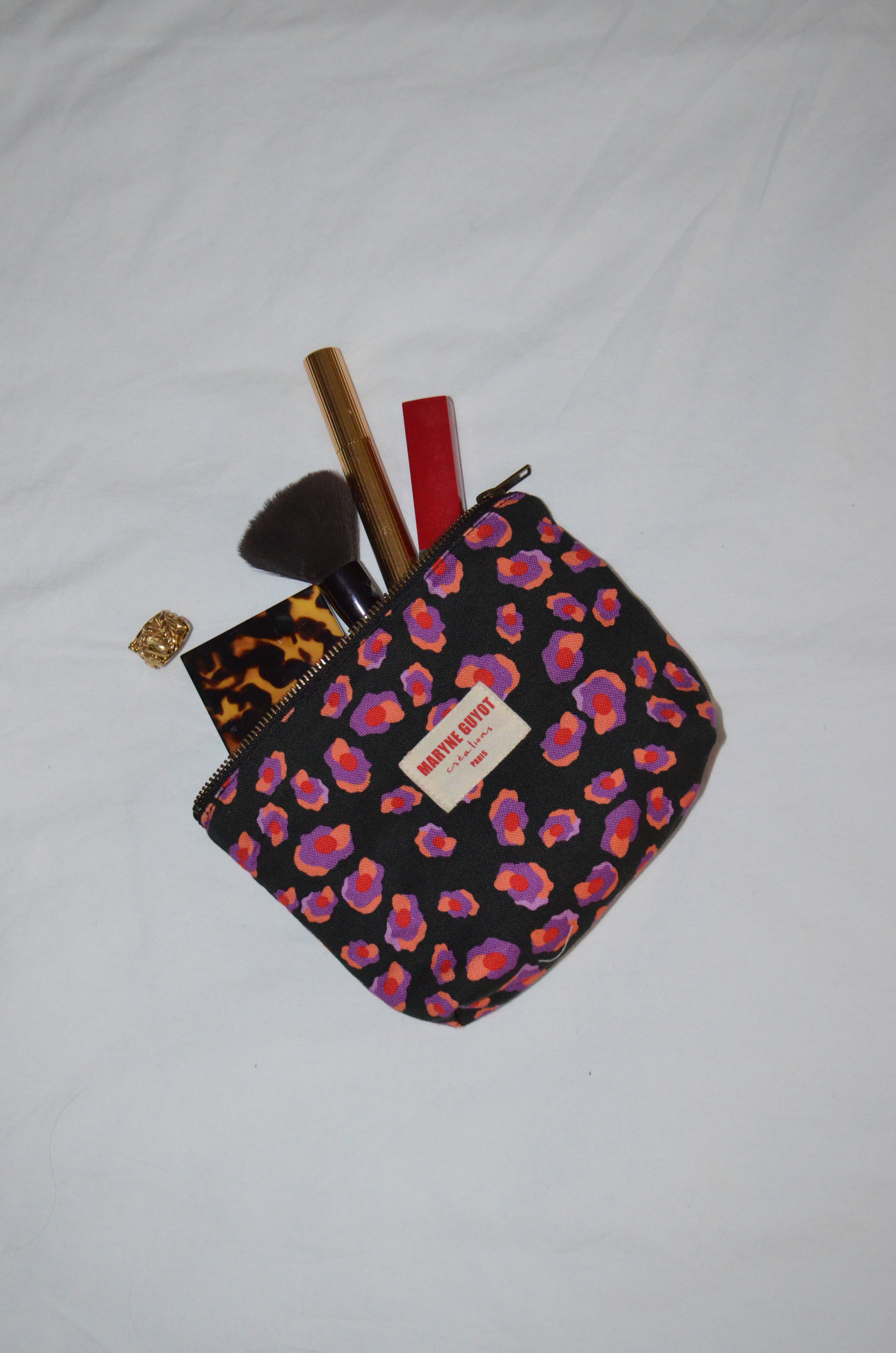 Pochette beauté motif léopard noir