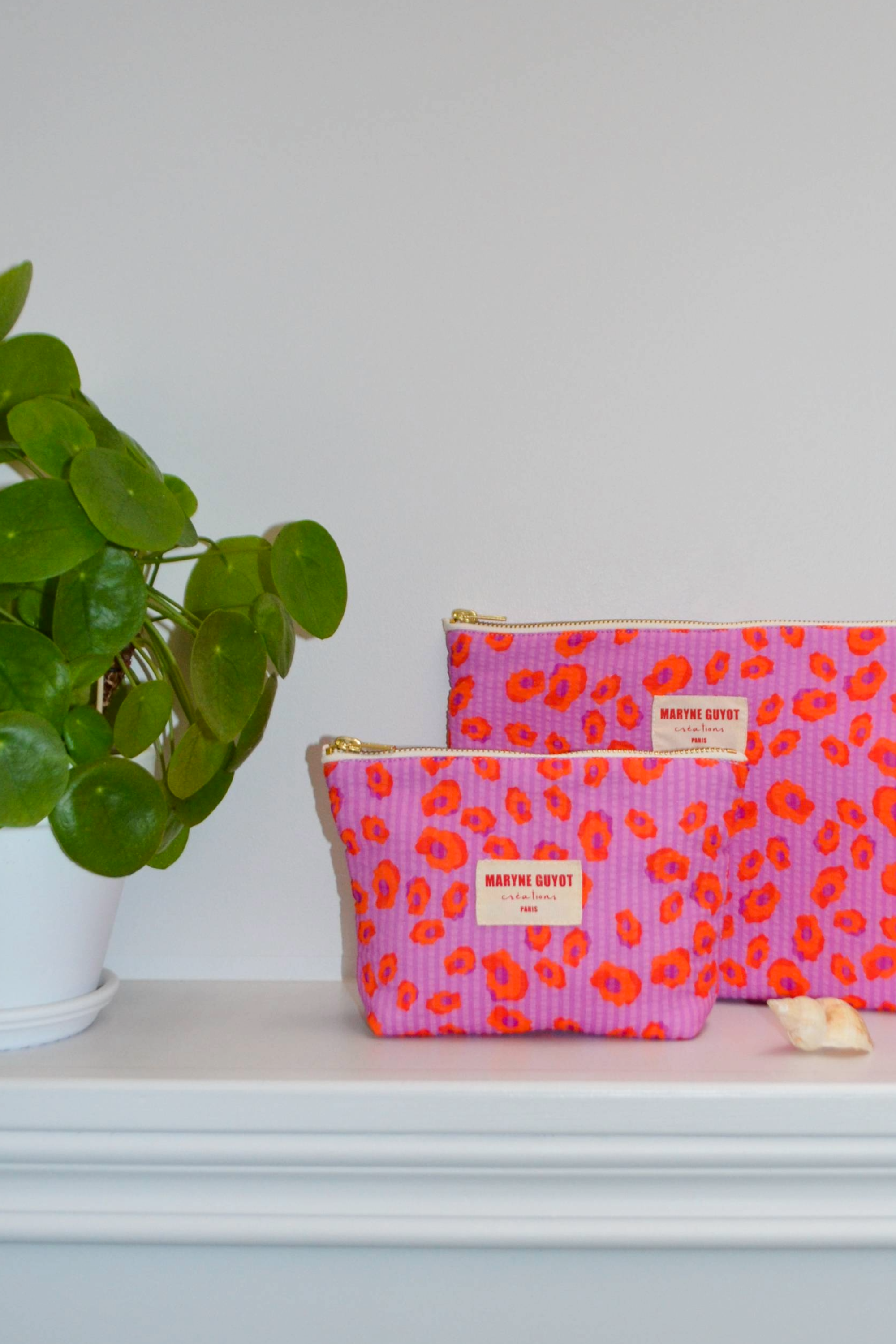 Pochette beauté motif léopard violet
